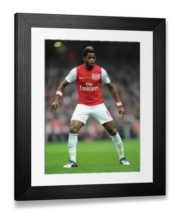Framed Print : Alex Song's Dominant Performance: Arsenal Crushes West Bromwich Albion 3-0 in Premier League