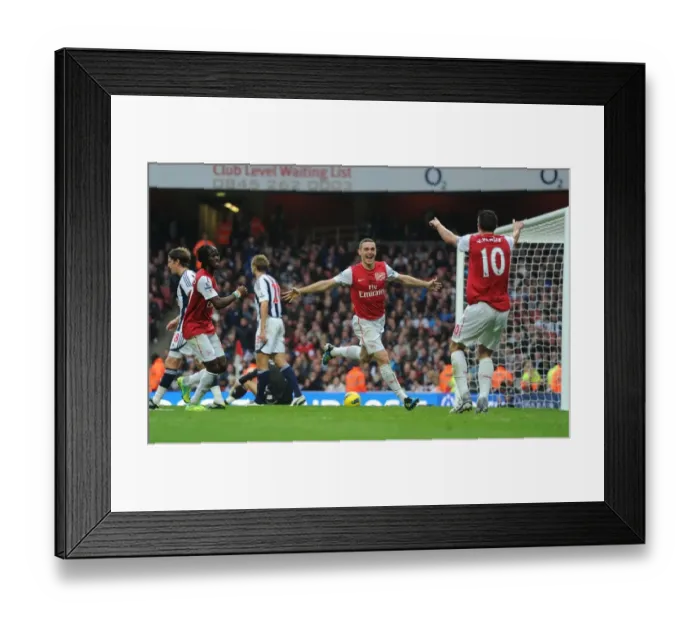 Framed Print : Arsenal's Triumph: Vermaelen, Van Persie, and Gervinho Celebrate Goals Against West Bromwich Albion (2011-12) Framed Print : Arsenal's Triumph: Vermaelen, Van Persie, and Gervinho Celebrate Goals Against West Bromwich Albion (2011-12)
