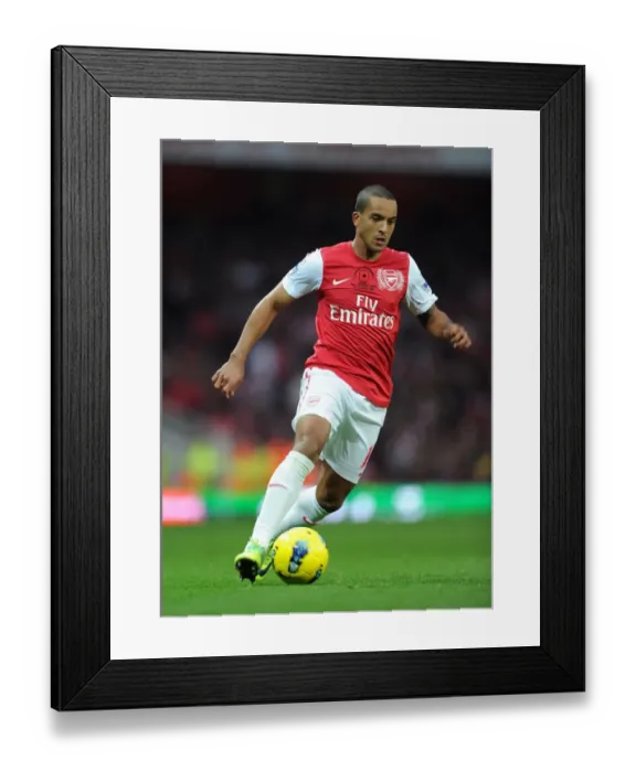 Framed Print : Theo Walcott's Triumph: Arsenal's 3-0 Victory over West Bromwich Albion in the Premier League (November 5, 2011)
