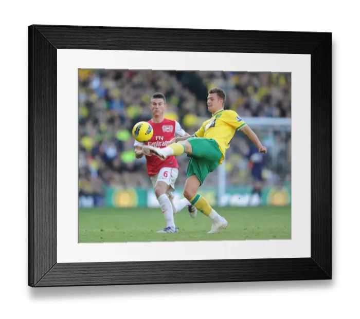 Framed Print : Koscielny vs. Surman: Intense Battle in Norwich City vs. Arsenal (2011-12)