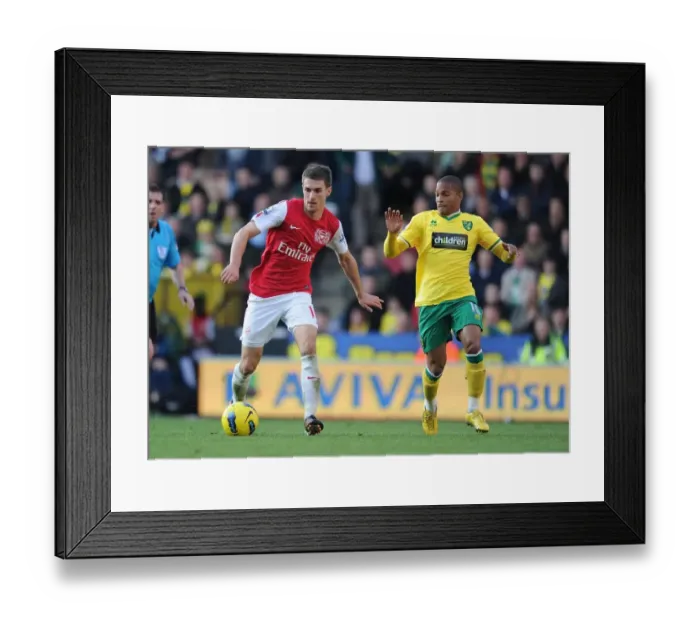 Framed Print : Aaron Ramsey Outmaneuvers Simeon Jackson: Norwich City vs. Arsenal, Premier League 2011-12