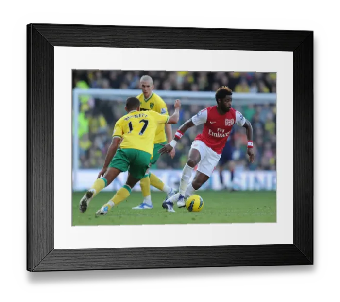 Framed Print : Alex Song Surges Past Elliott Bennett: Norwich City vs. Arsenal, Premier League 2011-12
