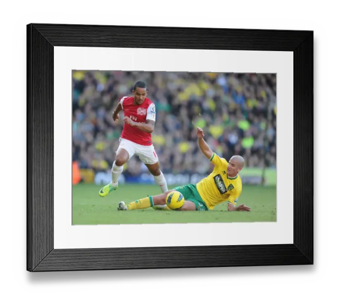 Framed Print : Theo Walcott Dashes Past Marc Tierney: Norwich City vs Arsenal, Premier League 2011-12 Framed Print : Theo Walcott Dashes Past Marc Tierney: Norwich City vs Arsenal, Premier League 2011-12