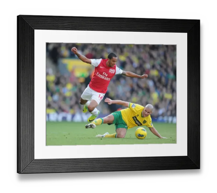 Framed Print : Theo Walcott Outmaneuvers Marc Tierney: A Premier League Moment, 2011-12 Framed Print : Theo Walcott Outmaneuvers Marc Tierney: A Premier League Moment, 2011-12