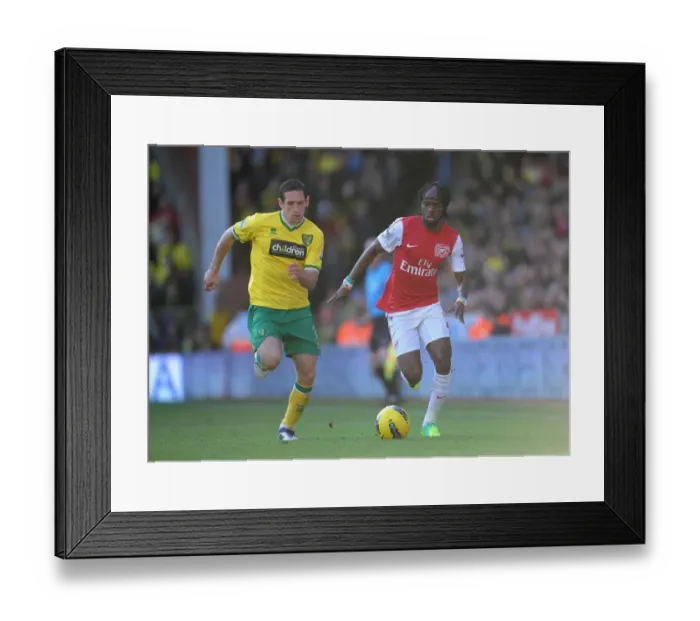 Framed Print : Gervinho vs. Crofts: A Premier League Battle at Carrow Road Framed Print : Gervinho vs. Crofts: A Premier League Battle at Carrow Road
