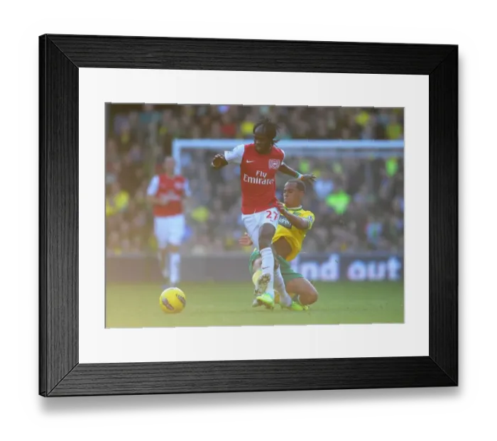 Framed Print : Gervinho vs. Kyle Naughton: A Premier League Battle at Carrow Road, November 19, 2011 Framed Print : Gervinho vs. Kyle Naughton: A Premier League Battle at Carrow Road, November 19, 2011