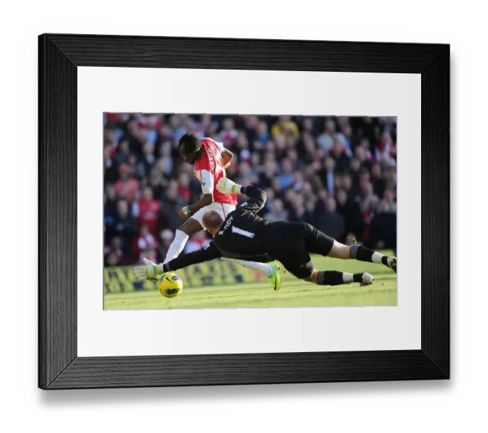 Framed Print : Gervinho vs John Ruddy: Intense Moment from Arsenal's Victory over Norwich City in the Premier League, November 2011