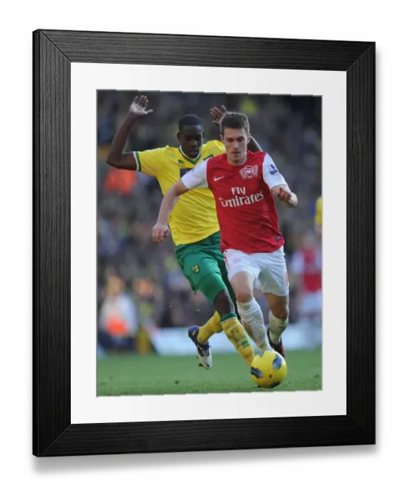 Framed Print : Ramsey vs Barnett: Arsenal's Victory over Norwich City in the Premier League, 19 / 11 / 11 Framed Print : Ramsey vs Barnett: Arsenal's Victory over Norwich City in the Premier League, 19 / 11 / 11