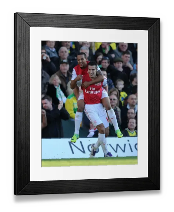 Framed Print : Arsenal's Double Strike: Van Persie and Walcott Celebrate Goals Against Norwich City, 2011-12 Framed Print : Arsenal's Double Strike: Van Persie and Walcott Celebrate Goals Against Norwich City, 2011-12