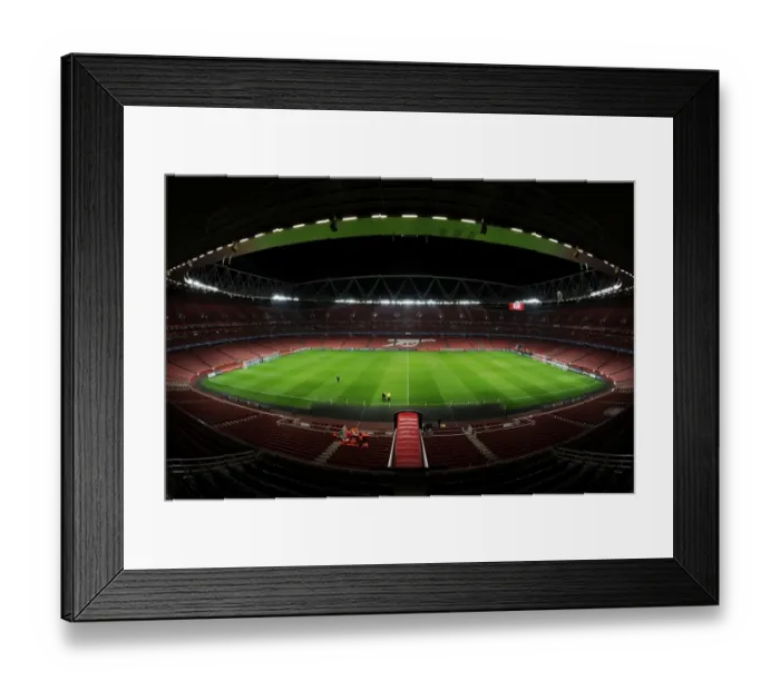 Framed Print : Champions League Clash: Arsenal vs. Borussia Dortmund at Emirates Stadium Framed Print : Champions League Clash: Arsenal vs. Borussia Dortmund at Emirates Stadium