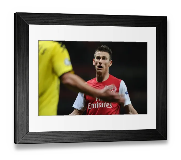 Framed Print : Laurent Koscielny: Arsenal's Defensive Wall Against Borussia Dortmund (2011-12)