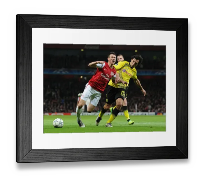 Framed Print : Clash of Titans: Koscielny vs. Hummels - Arsenal vs. Borussia Dortmund, UEFA Champions League