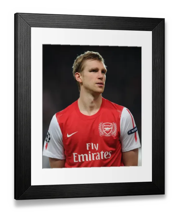 Framed Print : Arsenal vs Borussia Dortmund: Per Mertesacker Before UEFA Champions League Clash (2011-12)