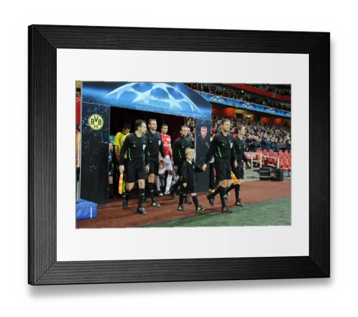 Framed Print : LONDON, ENGLAND - NOVEMBER 23: Officials before the UEFA Champions League Group F match between Arsenal FC and Borussia Dortmund at Emirates Stadium on November 23, 2011 in London, England. (Photo by David Price  /  Arsenal FC via