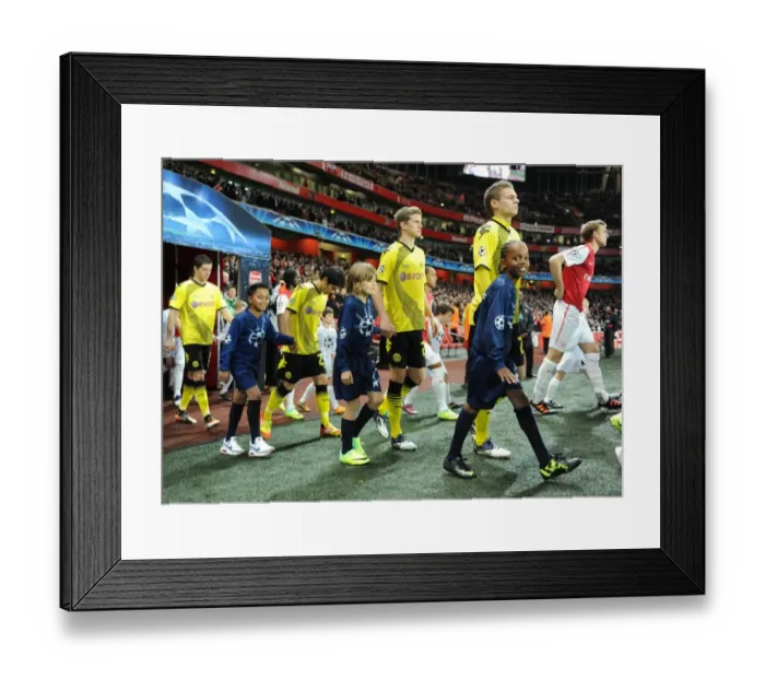 Framed Print : Champions League Clash: Arsenal FC vs Borussia Dortmund at Emirates Stadium (2011) Framed Print : Champions League Clash: Arsenal FC vs Borussia Dortmund at Emirates Stadium (2011)