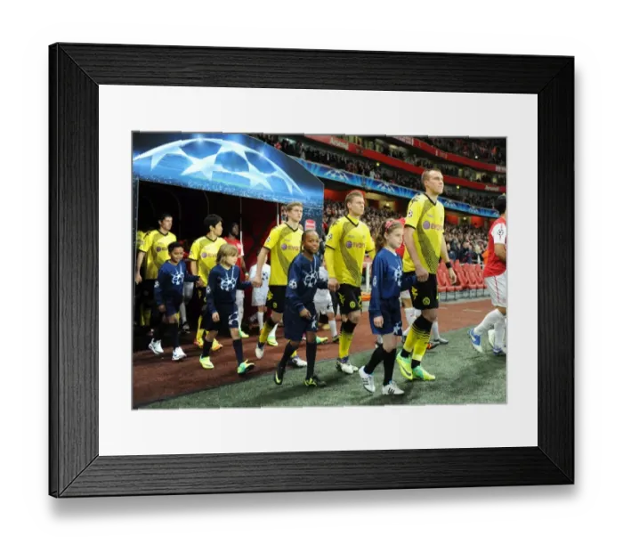 Framed Print : Champions League Clash: Arsenal FC vs. Borussia Dortmund - Player Escorts (2011-12) Framed Print : Champions League Clash: Arsenal FC vs. Borussia Dortmund - Player Escorts (2011-12)