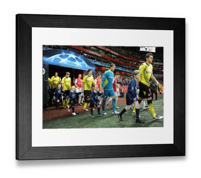 Framed Print : Arsenal vs Borussia Dortmund: Player Escorts in Champions League (2011-12) Framed Print : Arsenal vs Borussia Dortmund: Player Escorts in Champions League (2011-12)