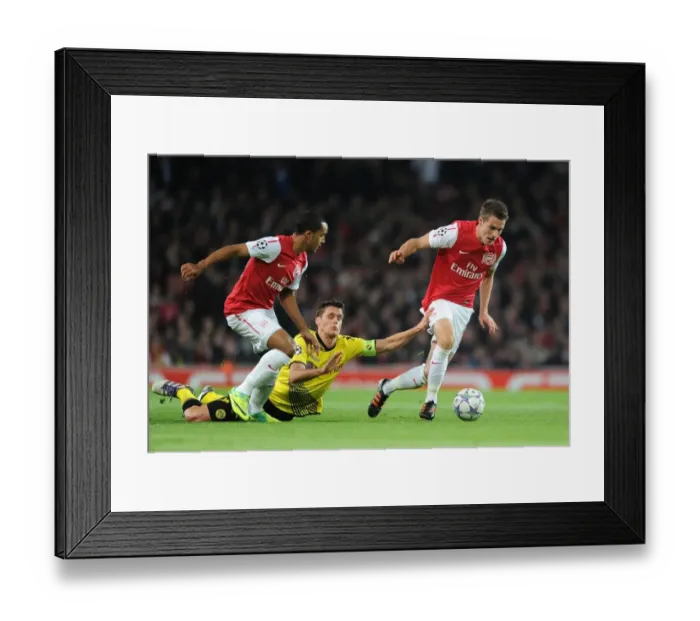 Framed Print : Arsenal's Ramsey and Walcott vs Dortmund's Kehl: A Battle in the 2011-12 Champions League