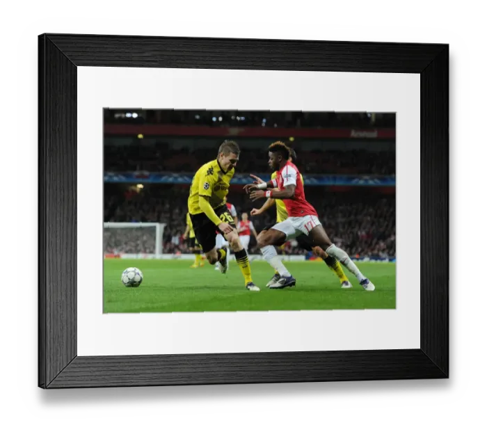 Framed Print : Arsenal vs Borussia Dortmund: Andre Santos Scores the Second Goal in the 2011-12 UEFA Champions League Match