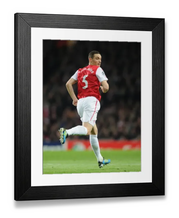 Framed Print : Thomas Vermaelen (Arsenal). Arsenal 2: 0 Borussia Dortmund. UEFA Champions League Framed Print : Thomas Vermaelen (Arsenal). Arsenal 2: 0 Borussia Dortmund. UEFA Champions League