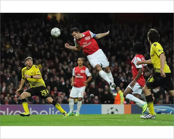 Robin van Persie Soars Above Dortmund: Arsenal's First Goal in Champions League Clash (2011)