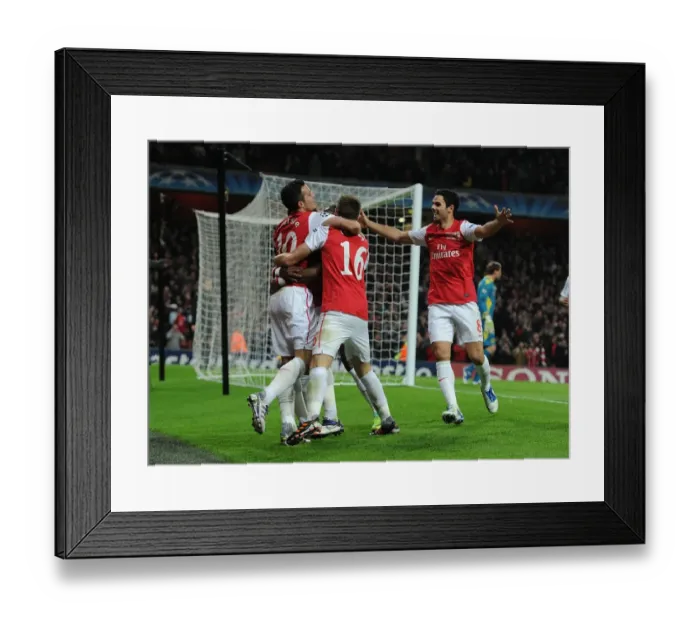 Framed Print : Robin van Persie's Goal Celebration: Arsenal vs. Borussia Dortmund, UEFA Champions League 2011-12