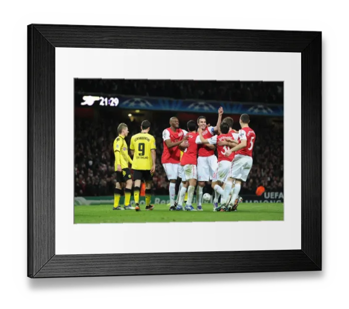 Framed Print : Arsenal's Unforgettable Victory: Robin van Persie's Double Strikes Borussia Dortmund in the Champions League Framed Print : Arsenal's Unforgettable Victory: Robin van Persie's Double Strikes Borussia Dortmund in the Champions League