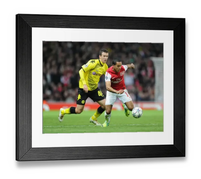Framed Print : Arsenal 2:0 Borussia Dortmund - Theo Walcott vs Ivan Perisic: UEFA Champions League Showdown in Group F at Emirages Stadium (November 23, 2011) Framed Print : Arsenal 2:0 Borussia Dortmund - Theo Walcott vs Ivan Perisic: UEFA Champions League Showdown in Group F at Emirages Stadium (November 23, 2011)