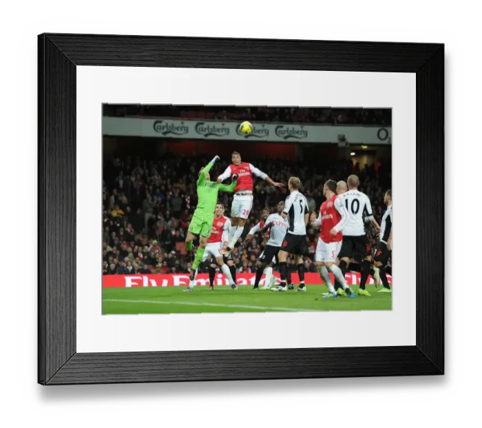 Framed Print : Arsenal vs. Fulham: Johan Djourou vs. Mark Schwarzer Clash at Emirates Stadium (2011-12)