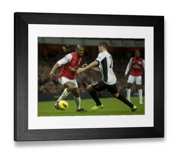 Framed Print : Abou Diaby of Arsenal takes on Clint Dempsey of Fulham during the Barclays Premier League match between Arsenal and Fulham at Emirates Stadium on November 26, 2011 in London, England. Credit; Arsenal Framed Print : Abou Diaby of Arsenal takes on Clint Dempsey of Fulham during the Barclays Premier League match between Arsenal and Fulham at Emirates Stadium on November 26, 2011 in London, England. Credit; Arsenal