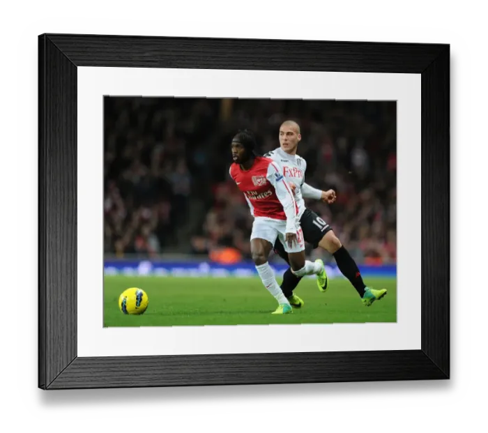 Framed Print : Gervinho vs. Kasami: Clash at the Emirates (Arsenal v Fulham 2011-12) Framed Print : Gervinho vs. Kasami: Clash at the Emirates (Arsenal v Fulham 2011-12)