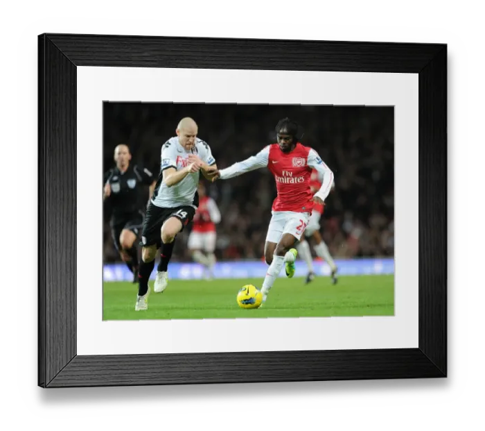 Framed Print : Gervinho vs. Philippe Senderos: A Battle Within Arsenal's Ranks (Arsenal v Fulham 2011-12)