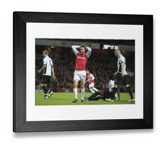 Framed Print : Aaron Ramsey in Action for Arsenal vs Fulham (2011-12) Framed Print : Aaron Ramsey in Action for Arsenal vs Fulham (2011-12)