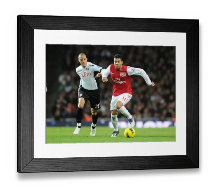 Framed Print : Arsenal's Andre Santos Clashes with Fulham's Bobby Zamora in Premier League Showdown