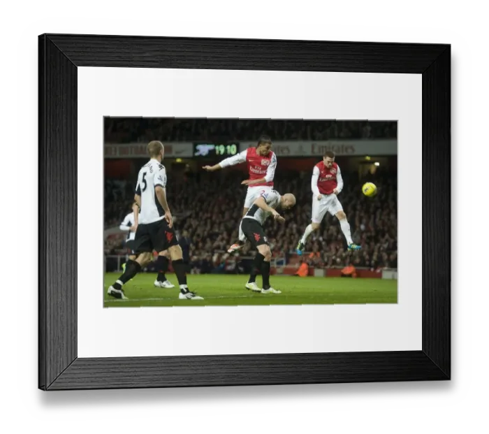 Framed Print : Thomas Vermaelen heads past ther Fulham defence to score the Arsenal goal during the Barclays Premier League match between Arsenal and Fulham at Emirates Stadium on November 26, 2011 in London, England. Credit; Arsenal Framed Print : Thomas Vermaelen heads past ther Fulham defence to score the Arsenal goal during the Barclays Premier League match between Arsenal and Fulham at Emirates Stadium on November 26, 2011 in London, England. Credit; Arsenal
