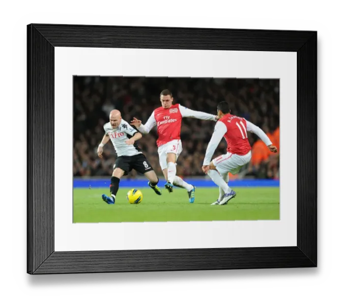 Framed Print : Thomas Vermaelen vs. Andy Johnson: A Battle at the Emirates (Arsenal v Fulham, 2011-12)