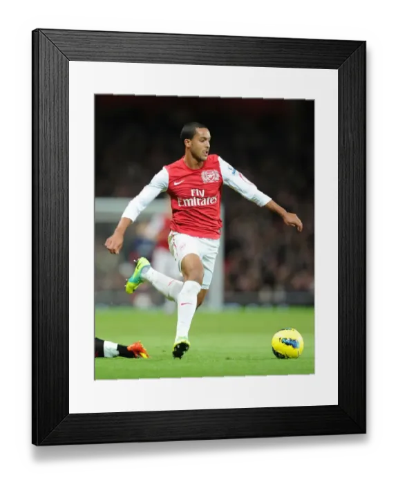 Framed Print : LONDON, ENGLAND - NOVEMBER 26: Theo Walcott of Arsenal during the Barclays Premier League match between Arsenal Framed Print : LONDON, ENGLAND - NOVEMBER 26: Theo Walcott of Arsenal during the Barclays Premier League match between Arsenal
