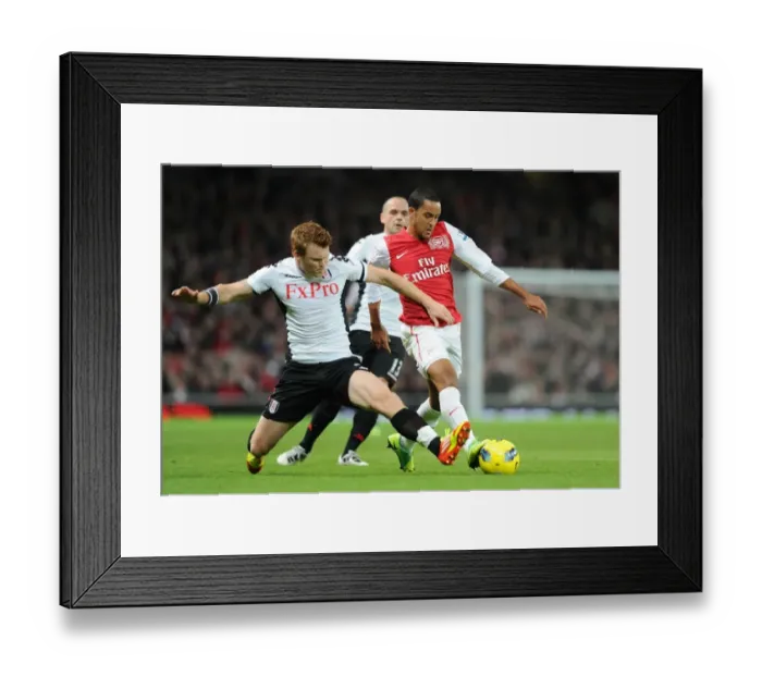 Framed Print : Theo Walcott Outsmarts John Arne Riise: Arsenal vs. Fulham, Premier League 2011-12