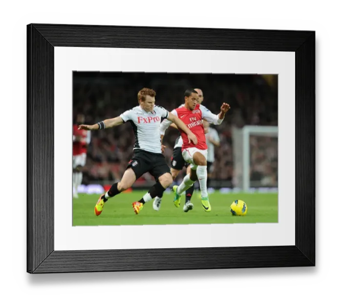 Framed Print : Theo Walcott's Sensational Run Past John Arne Riise: A Flash of Skill and Agility from the Arsenal vs Fulham Match (2011-12)