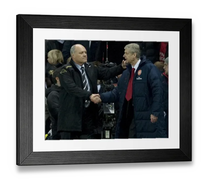 Framed Print : Arsenal manager Arsene Wenger and Fulham manager Martin Jol after the Barclays Premier League match between Arsenal and Fulham at Emirates Stadium on November 26, 2011 in London, England. Credit; Arsenal
