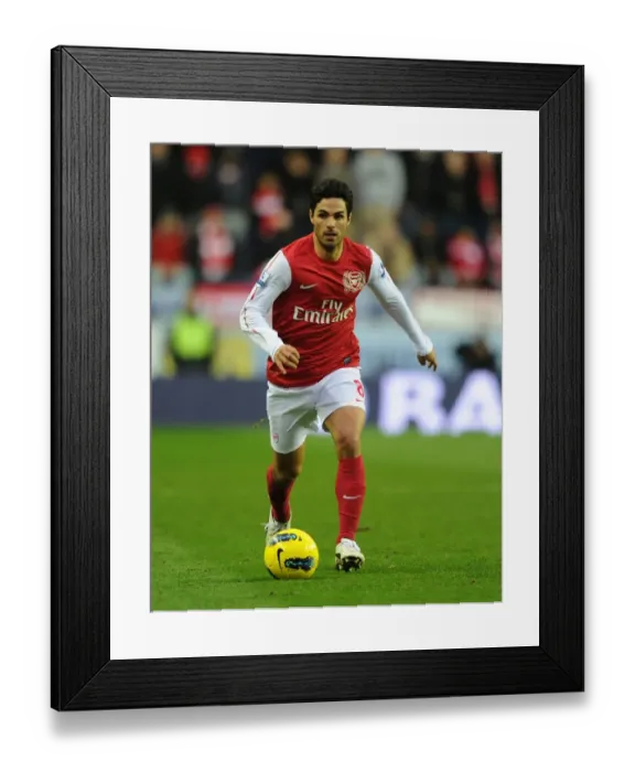 Framed Print : Mikel Arteta Leads Arsenal in Premier League Battle against Wigan Athletic (2011-12)