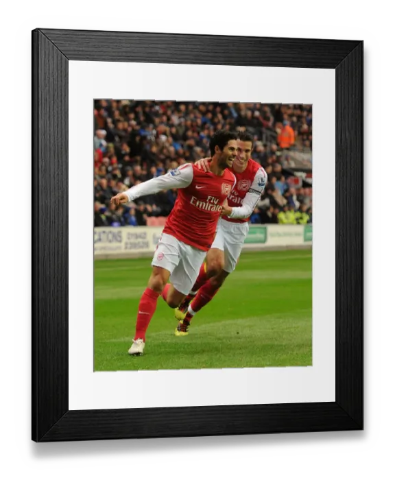 Framed Print : Mikel Arteta and Robin van Persie Celebrate First Goal: Wigan Athletic vs. Arsenal, 2011-12 Premier League Framed Print : Mikel Arteta and Robin van Persie Celebrate First Goal: Wigan Athletic vs. Arsenal, 2011-12 Premier League
