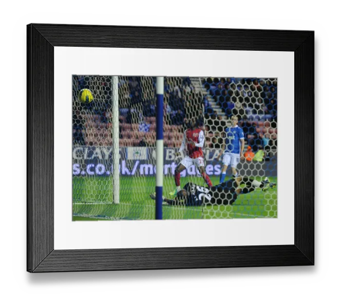 Framed Print : Gervinho Scores Third Goal: Wigan Athletic vs. Arsenal, Premier League 2011-12 Framed Print : Gervinho Scores Third Goal: Wigan Athletic vs. Arsenal, Premier League 2011-12