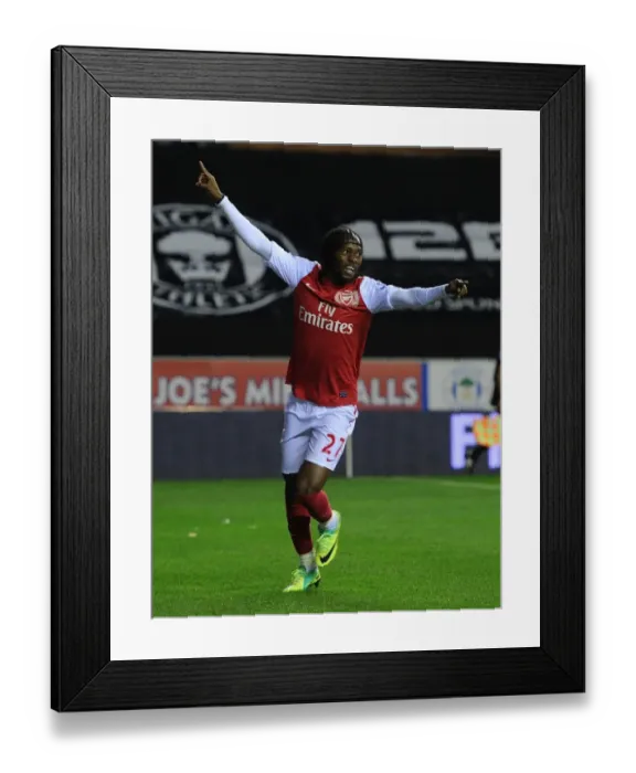 Framed Print : Gervinho's Hat-Trick: Arsenal's Dominance Over Wigan Athletic in 2011-12 Premier League Framed Print : Gervinho's Hat-Trick: Arsenal's Dominance Over Wigan Athletic in 2011-12 Premier League
