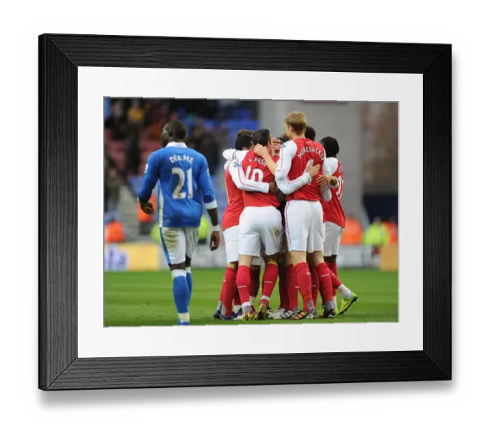 Framed Print : Arsenal Celebrate Vermaelen's Goal: Wigan Athletic vs Arsenal, Premier League 2011-12