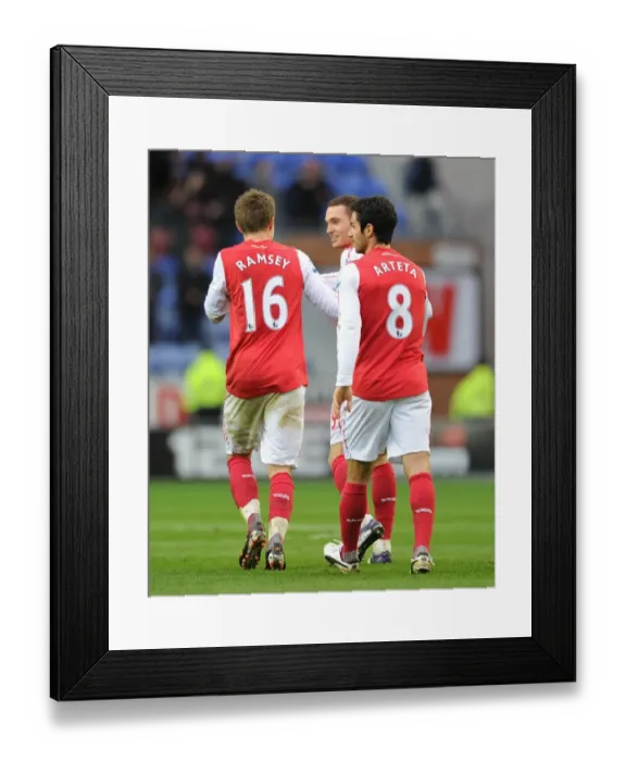 Framed Print : Vermaelen and Arsenal Celebrate Second Goal Against Wigan Athletic (2011-12)