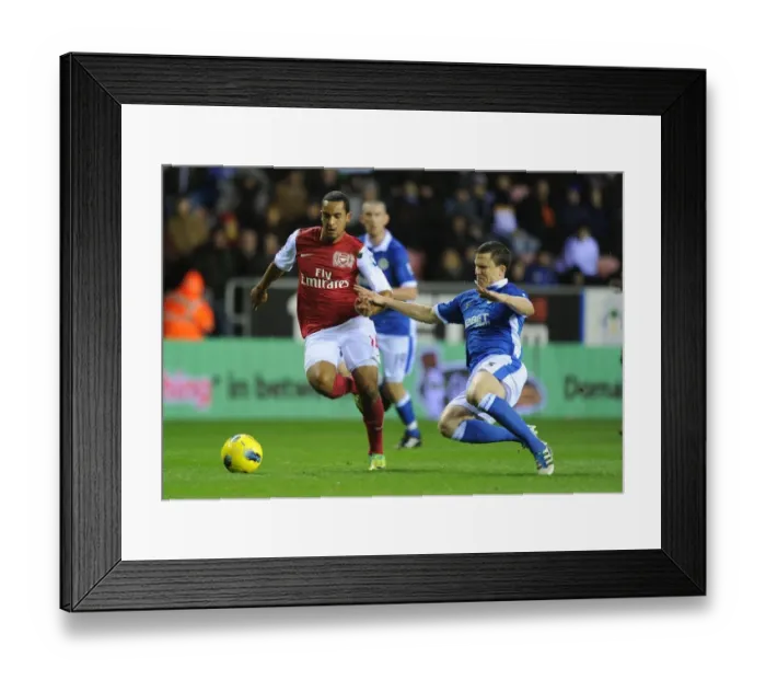 Framed Print : Theo Walcott Surges Past Gary Caldwell: Wigan Athletic vs. Arsenal, Premier League 2011-12