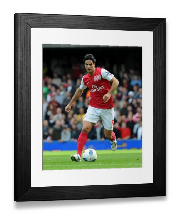Framed Print : Arsenal's Triumph: Mikel Arteta Leads Gunners to a 5-3 Victory over Chelsea in the Premier League (2011-12)