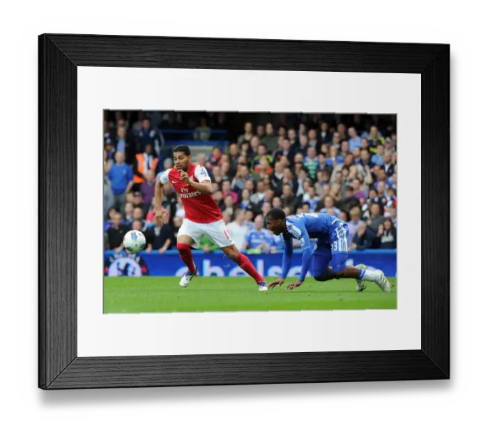 Framed Print : Arsenal's Thrilling 5-3 Comeback Victory over Chelsea in the Premier League: Andre Santos and Dean Sturridge Clash at Stamford Bridge, October 2011