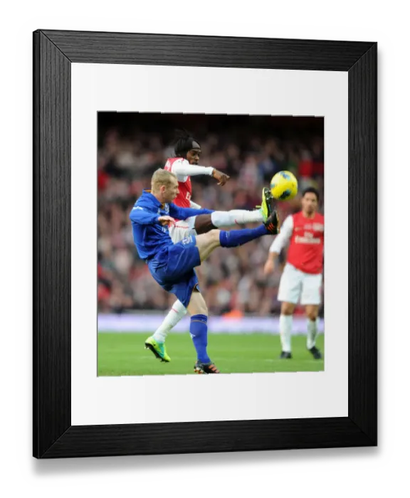 Framed Print : Arsenal vs Everton: Gervinho vs Hibbert in Intense Premier League Clash (2011-12)